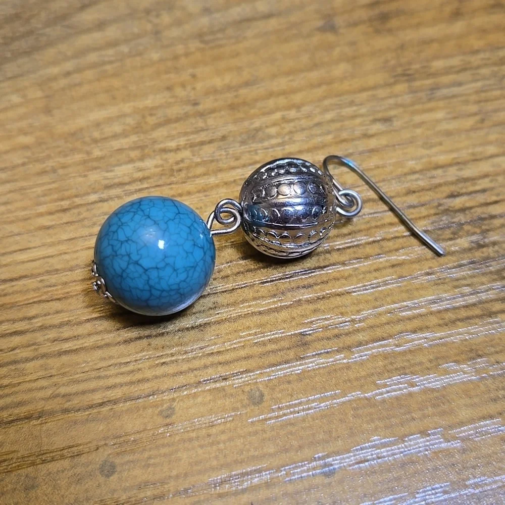 Blue and silver toned hanging earrings